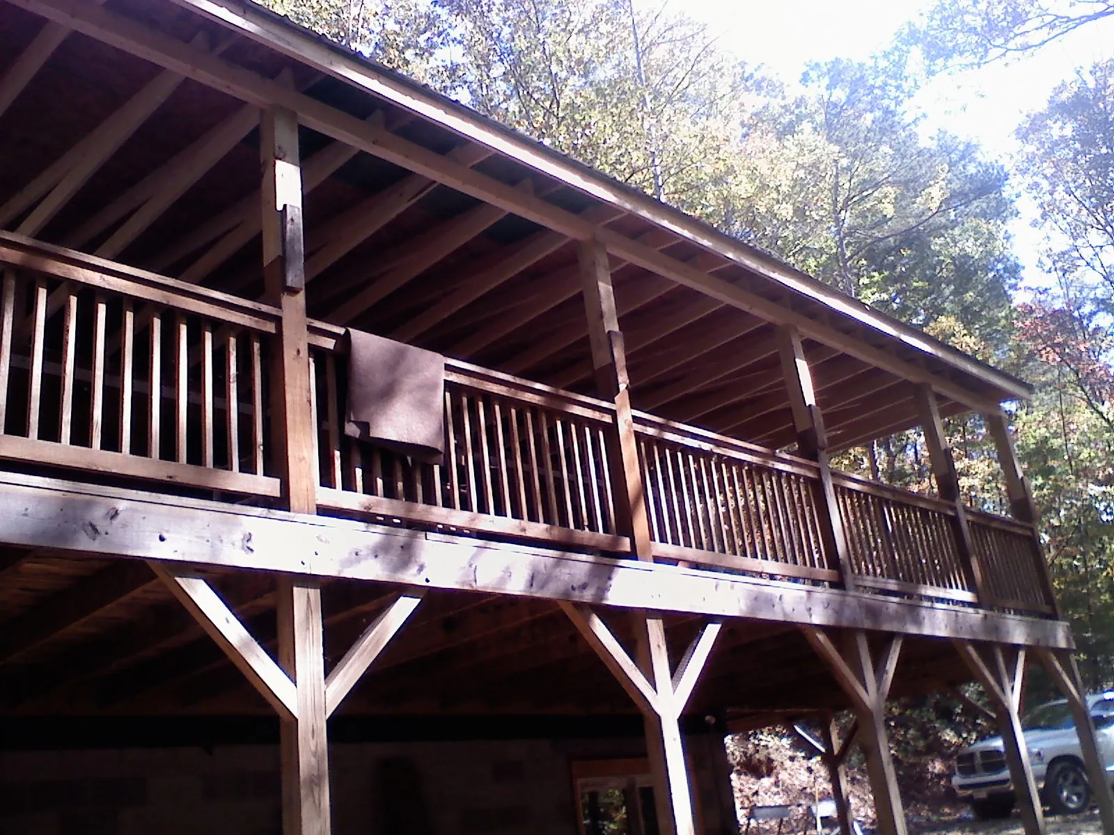 Timber framing under a new elevated porch and deck — Roof Leak Repair in Metropolis by Roofing Brothers